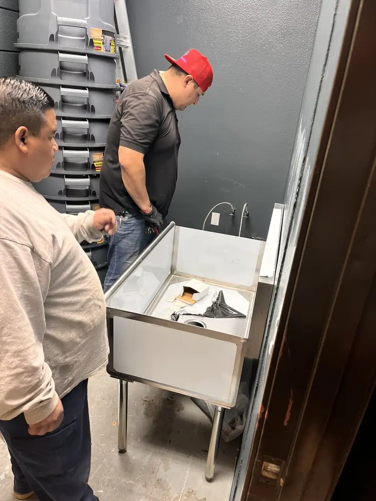 Commercial plumbing and sink installation in Denver